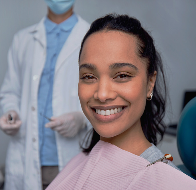 woman happy with the result of her treatment thanks to dental tourism